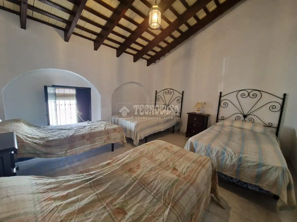 Habitación de Casa adosada en venta en Osuna con Aire acondicionado y Terraza