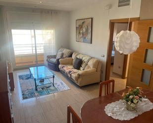 Living room of Flat for sale in Sant Jaume d'Enveja  with Air Conditioner, Furnished and Balcony