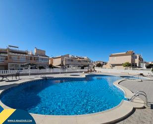 Swimming pool of House or chalet for sale in Torrevieja  with Air Conditioner, Heating and Terrace