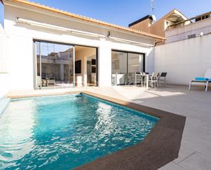 Swimming pool of Single-family semi-detached for sale in Sabadell  with Air Conditioner, Heating and Parquet flooring