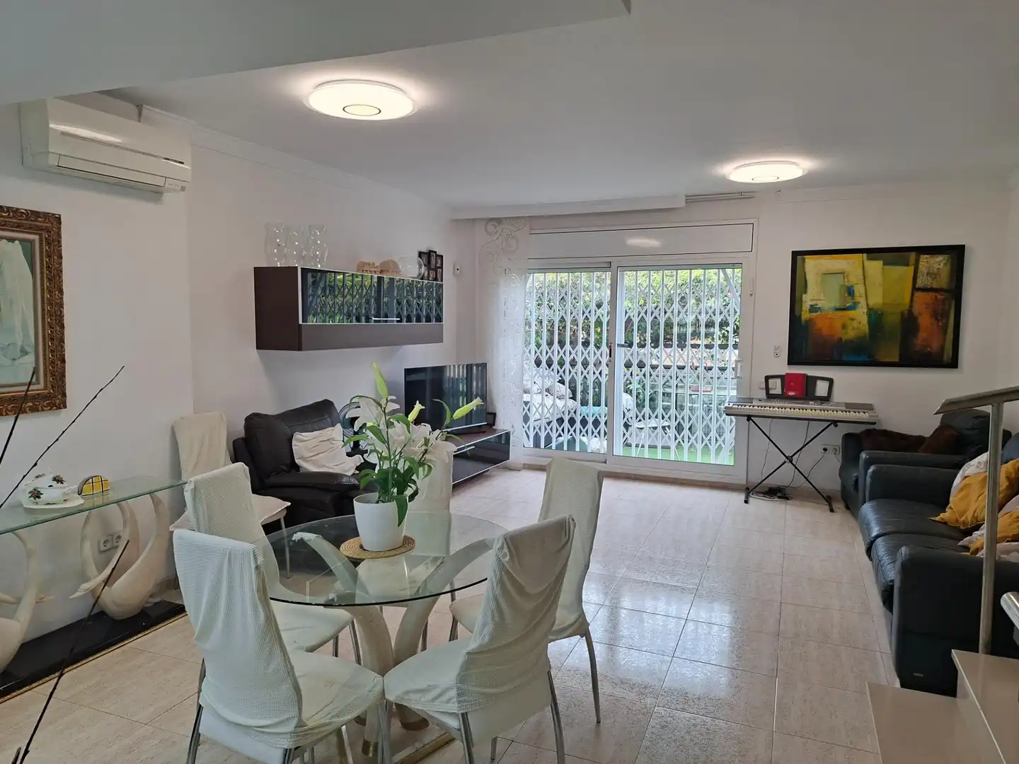 Living room of Detached homes for sale in Calafell  with Air Conditioner, Private garden and Terrace