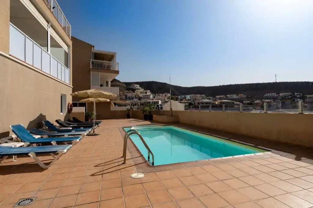 Piscina de Apartamento en venta en Mogán con Aire acondicionado, Parquet y Terraza