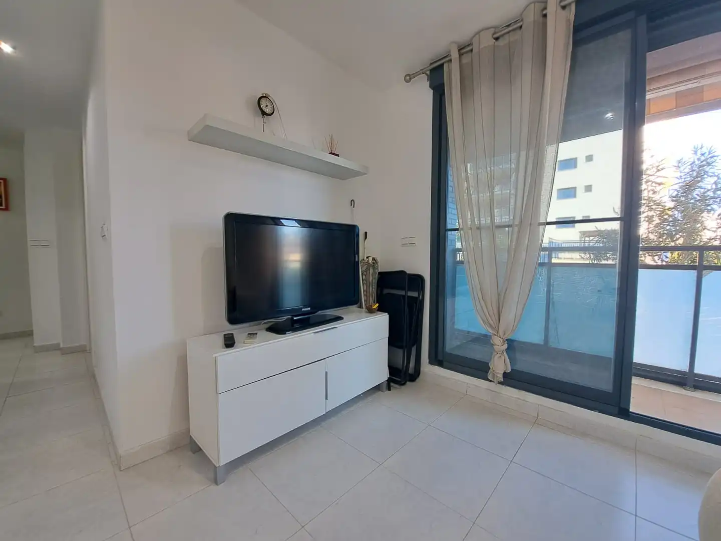 Sala d'estar de Apartament en venda en Moncofa amb Aire condicionat, Terrassa i Moblat