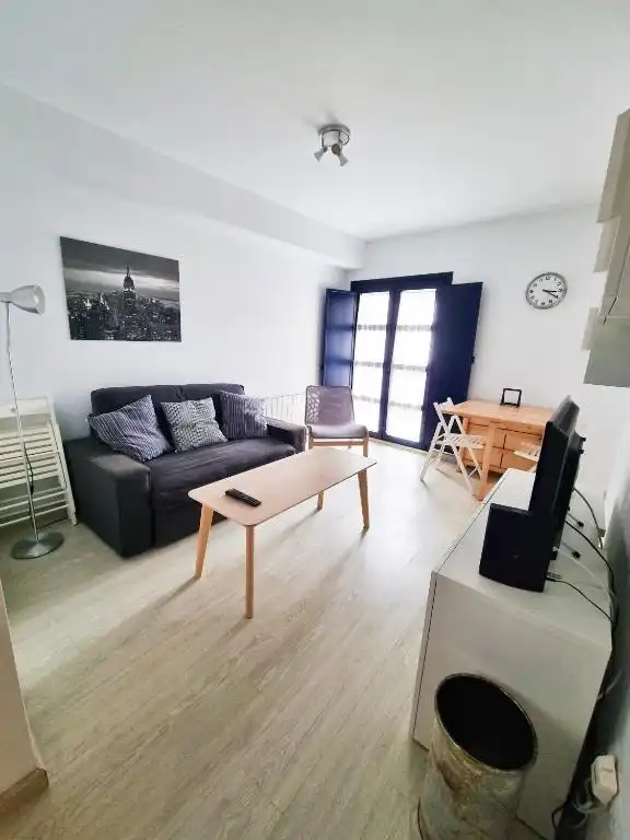 Sala de estar de Piso en venta en Cudillero con Calefacción, Parquet y Amueblado