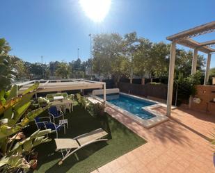 Swimming pool of Duplex for sale in  Sevilla Capital  with Air Conditioner, Heating and Private garden