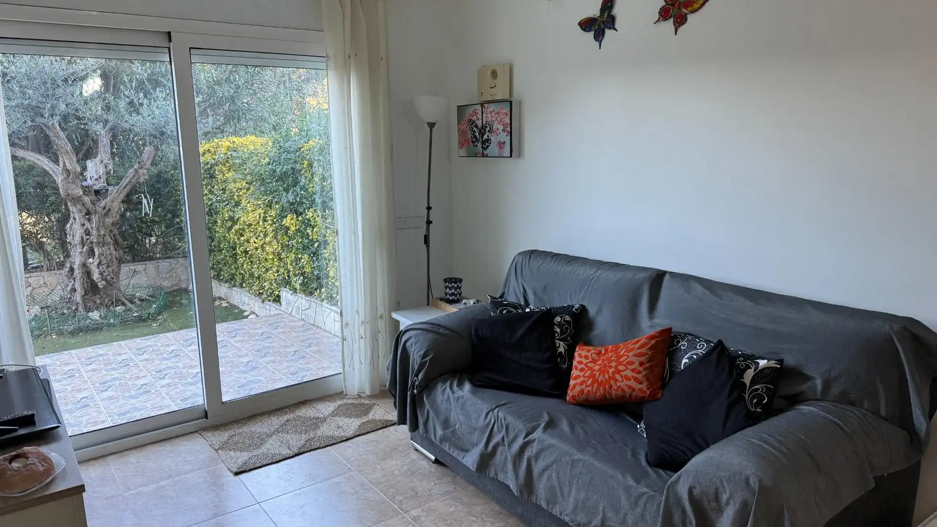 Living room of Ground floor for sale in Castell d'Aro, Platja d'Aro i s'Agaró  with Air Conditioner, Private garden and Storage room