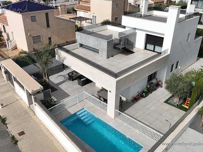 Swimming pool of House or chalet for sale in Orihuela  with Air Conditioner, Heating and Private garden