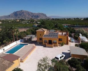 Vista exterior de Finca rústica en venda en Orihuela amb Aire condicionat i Piscina