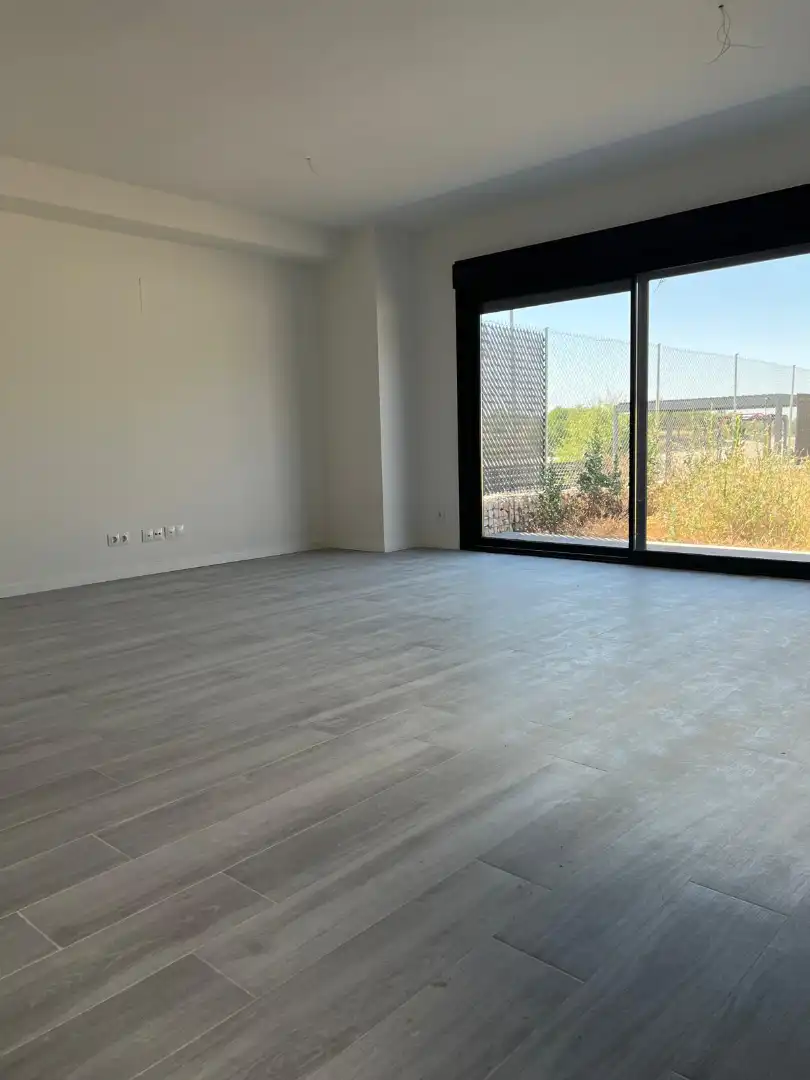 Sala de estar de Casa adosada en venta en Villalbilla con Calefacción, Jardín privado y Terraza