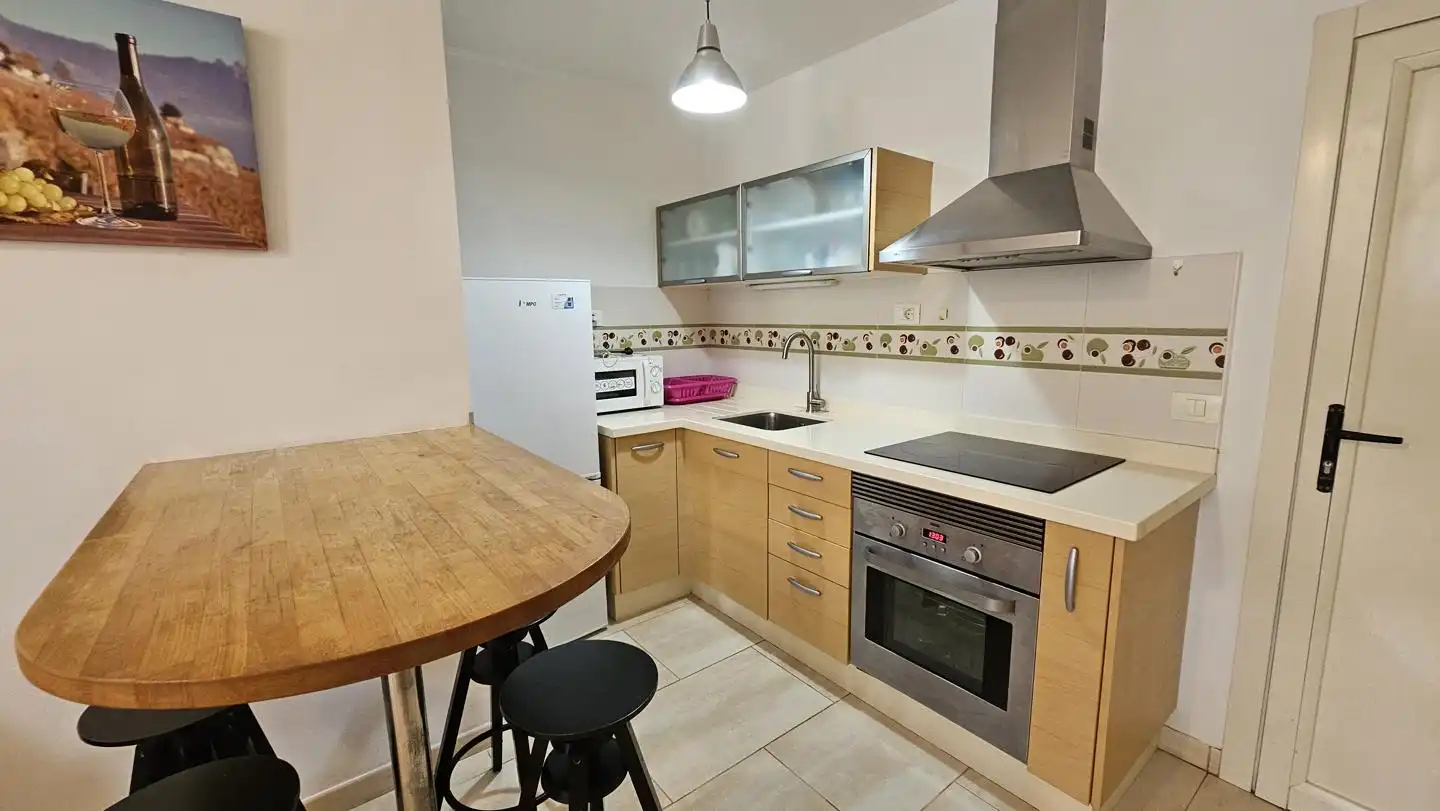 Kitchen of Flat for sale in San Bartolomé de Tirajana  with Air Conditioner, Furnished and Community pool