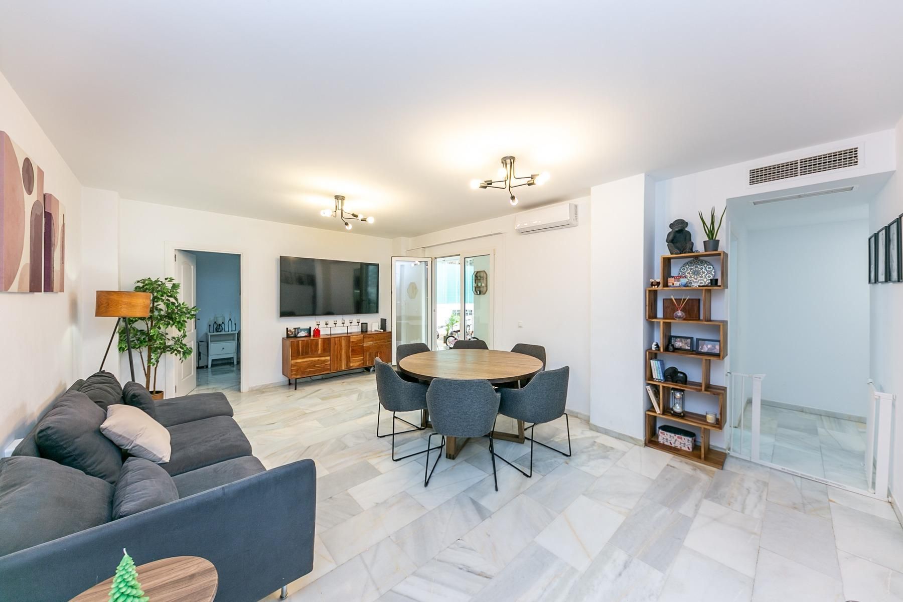 Living room of Planta baja for sale in Benalmádena  with Air Conditioner, Heating and Terrace