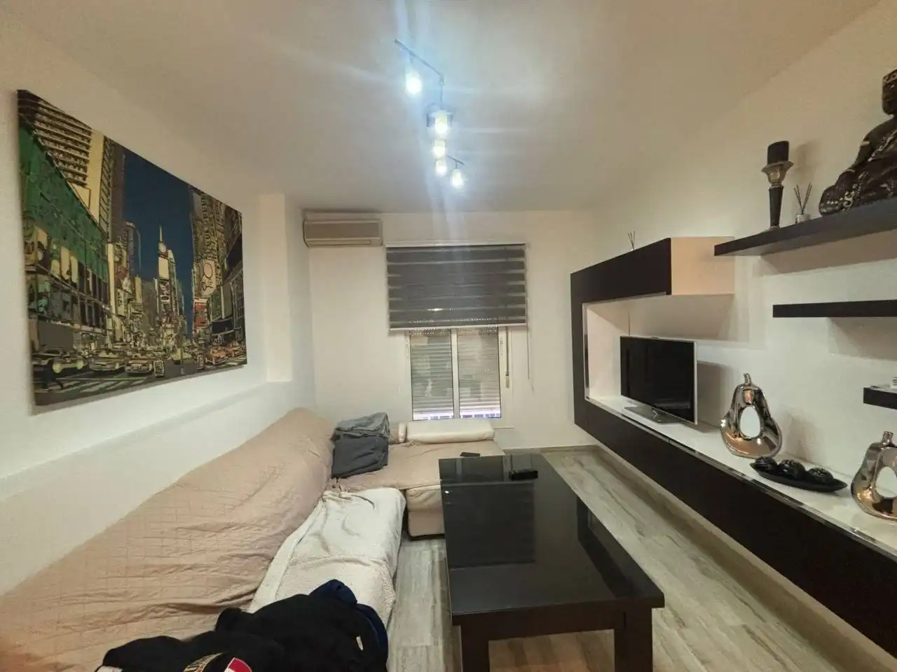 Sala de estar de Casa adosada en venta en Dos Hermanas con Aire acondicionado, Calefacción y Jardín privado