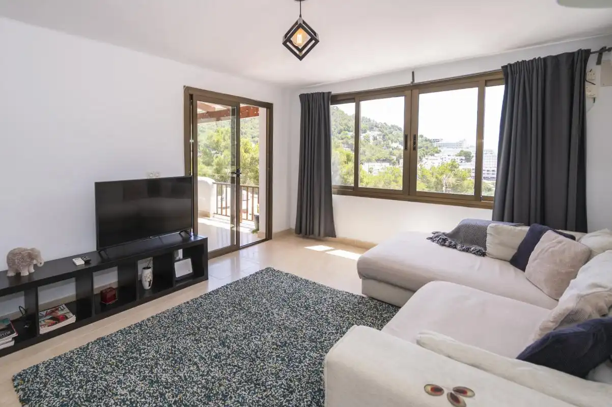 Sala d'estar de Pis en venda en Santa Eulària des Riu amb Aire condicionat, Calefacció i Jardí privat