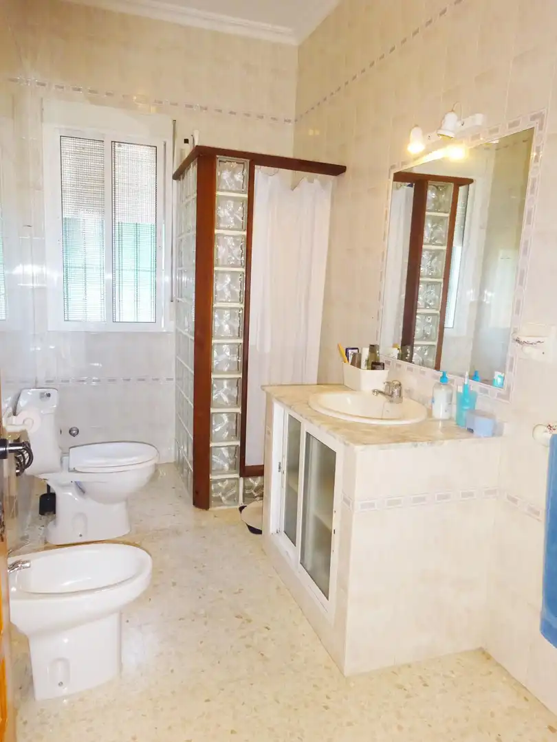 Bathroom of Houses for sale in Sanlúcar la Mayor  with Air Conditioner, Private garden and Storage room