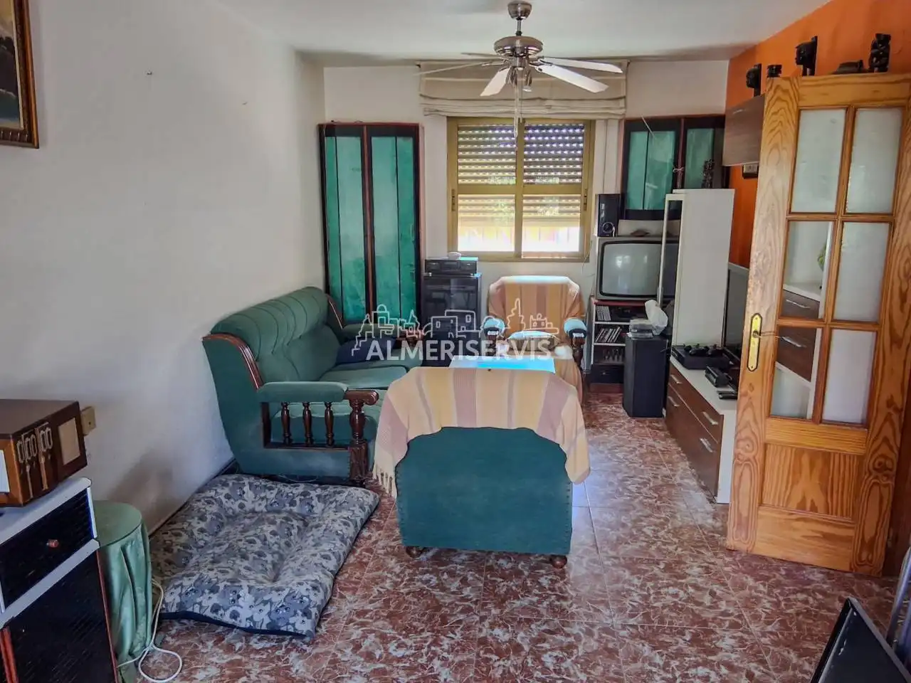 Sala de estar de Casa adosada en venta en El Ejido con Aire acondicionado, Terraza y Amueblado