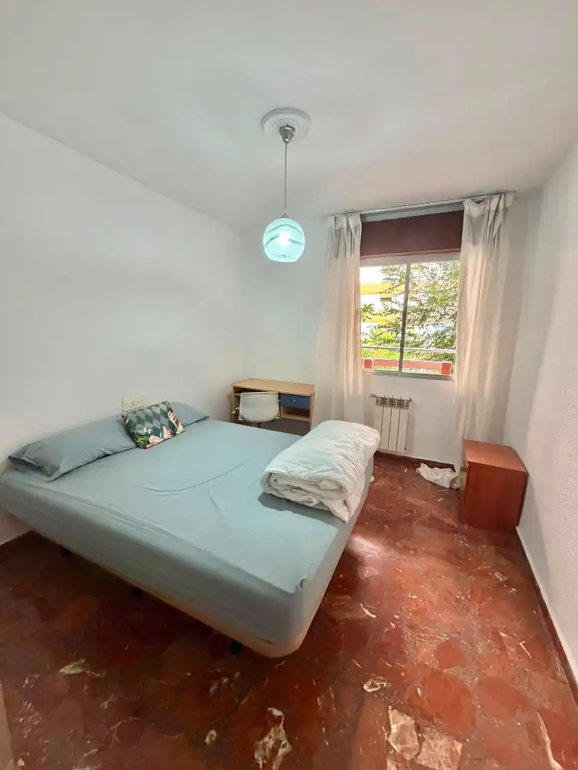 Bedroom of Flat for share in Jaén  with Air Conditioner, Heating and Furnished