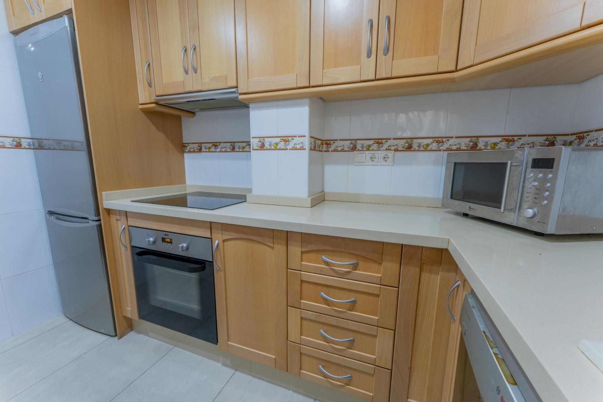 Kitchen of Flat for sale in Santa Pola  with Air Conditioner, Private garden and Parquet flooring