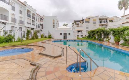 Swimming pool of Flat for sale in Motril  with Air Conditioner, Terrace and Swimming Pool