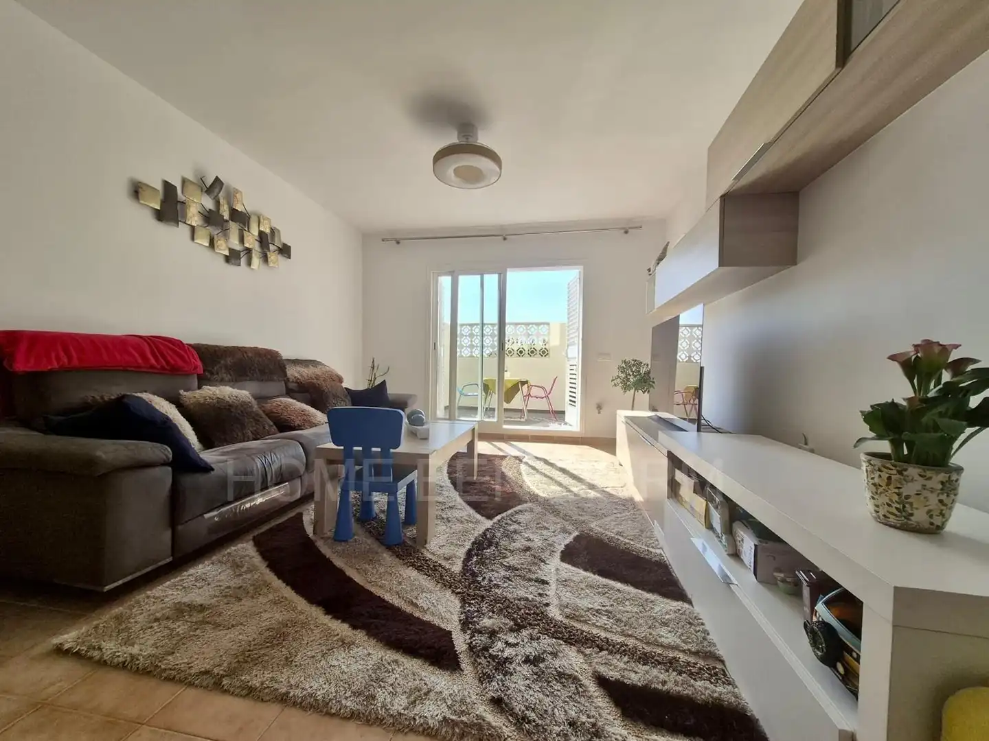 Sala de estar de Casa adosada en venta en Finestrat con Jardín privado y Piscina comunitaria