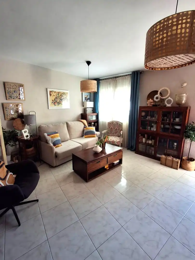 Sala de estar de Casa adosada en venta en Málaga con Aire acondicionado y Balcón