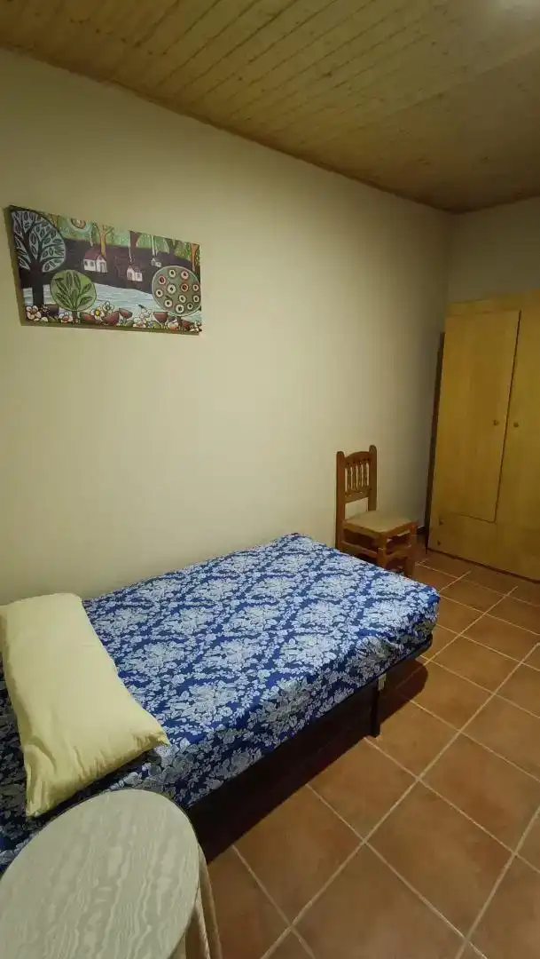 Dormitori de Casa adosada en venda en Fresneda de la Sierra amb Moblat