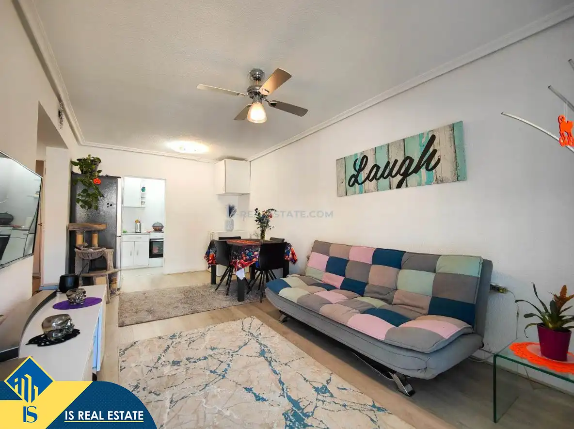Sala de estar de Casa adosada en venta en Torrevieja con Aire acondicionado, Calefacción y Jardín privado