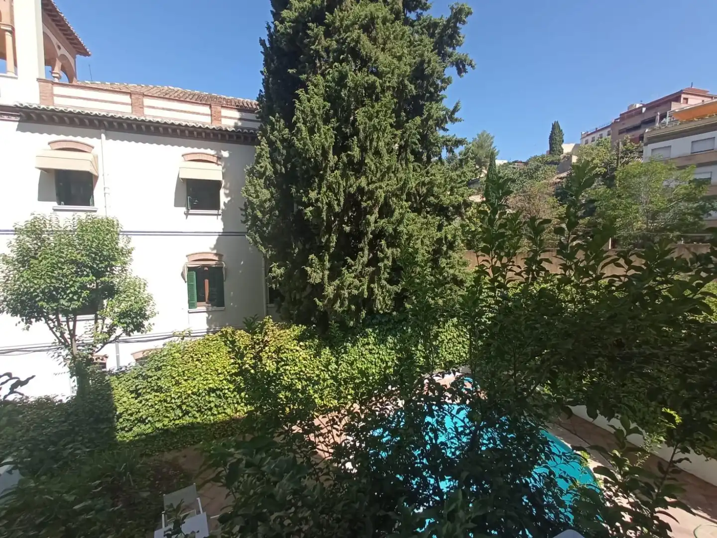 Jardí de Apartament de lloguer en Granada amb Aire condicionat, Piscina i Piscina comunitària