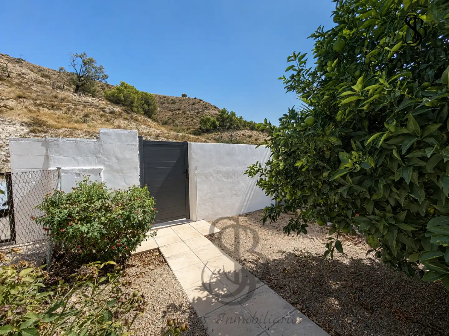 Vista exterior de Casa adosada en venta en Busot con Aire acondicionado, Calefacción y Jardín privado