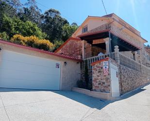 Exterior view of House or chalet for sale in Muros  with Air Conditioner, Heating and Private garden