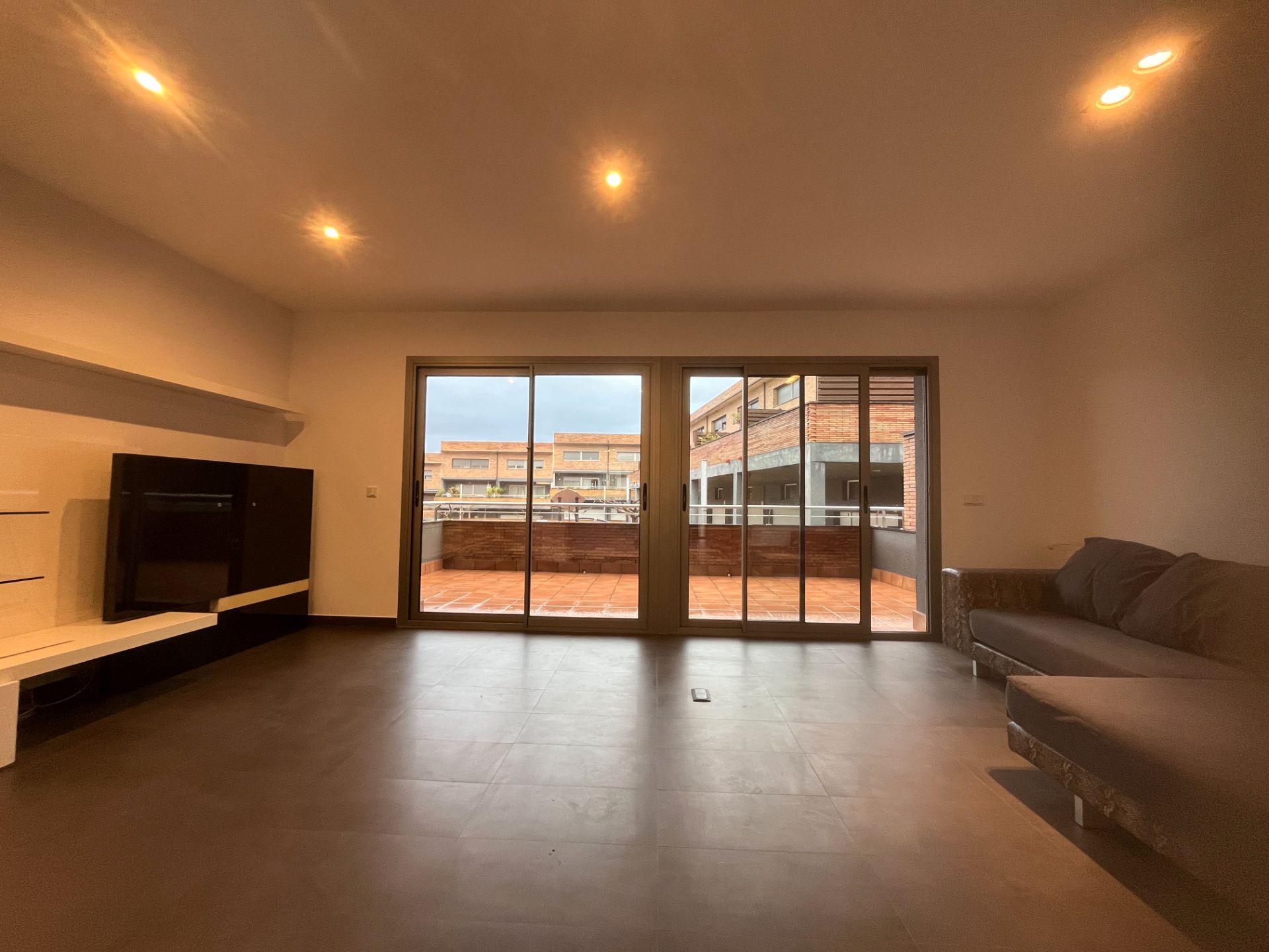 Sala de estar de Casa adosada en venta en Fornells de la Selva con Aire acondicionado, Calefacción y Jardín privado