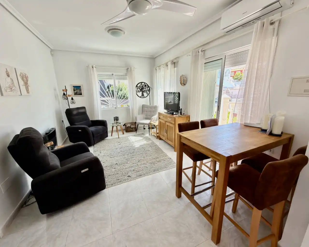 Sala d'estar de Casa o xalet en venda en Rojales amb Aire condicionat, Jardí privat i Terrassa