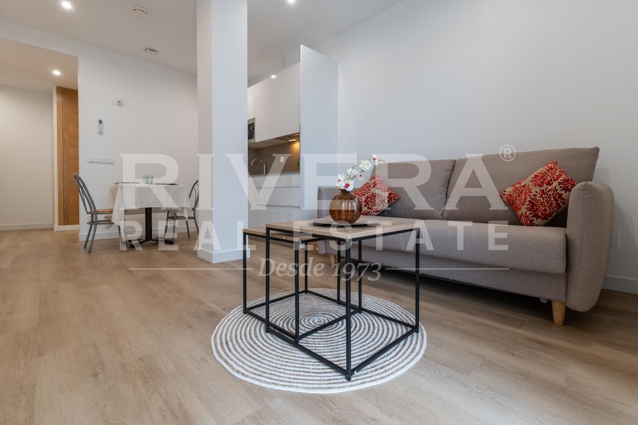 Sala d'estar de Apartament en venda en Sanxenxo amb Aire condicionat, Calefacció i Terrassa