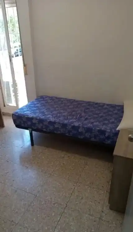 Dormitori de Pis de lloguer en Jaén amb Aire condicionat, Terrassa i Moblat