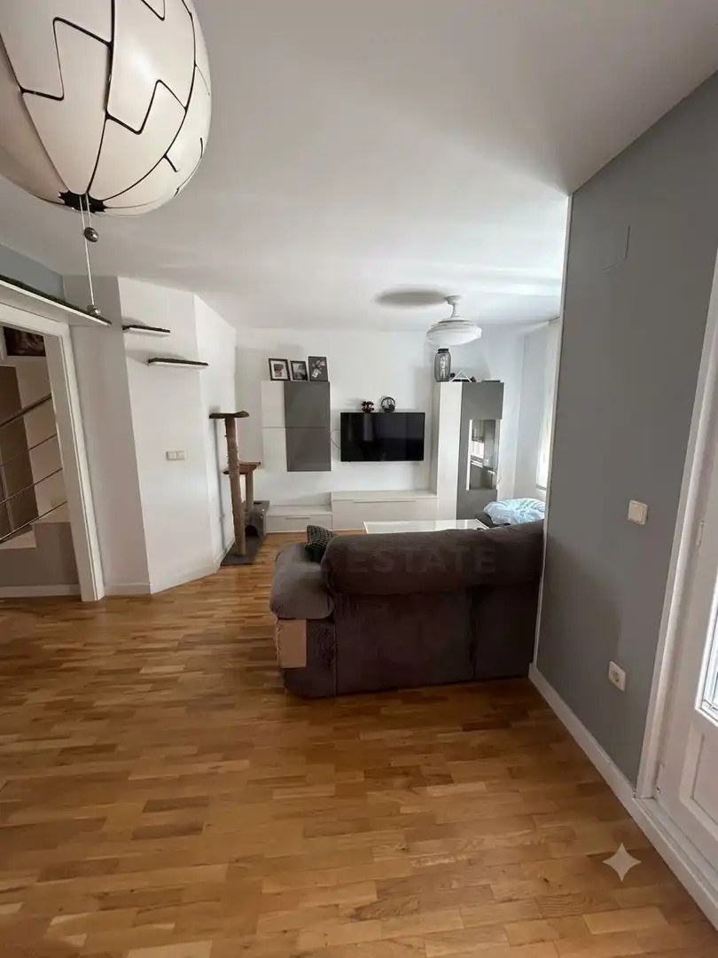 Sala d'estar de Casa adosada en venda en San Andrés del Rabanedo amb Calefacció i Terrassa