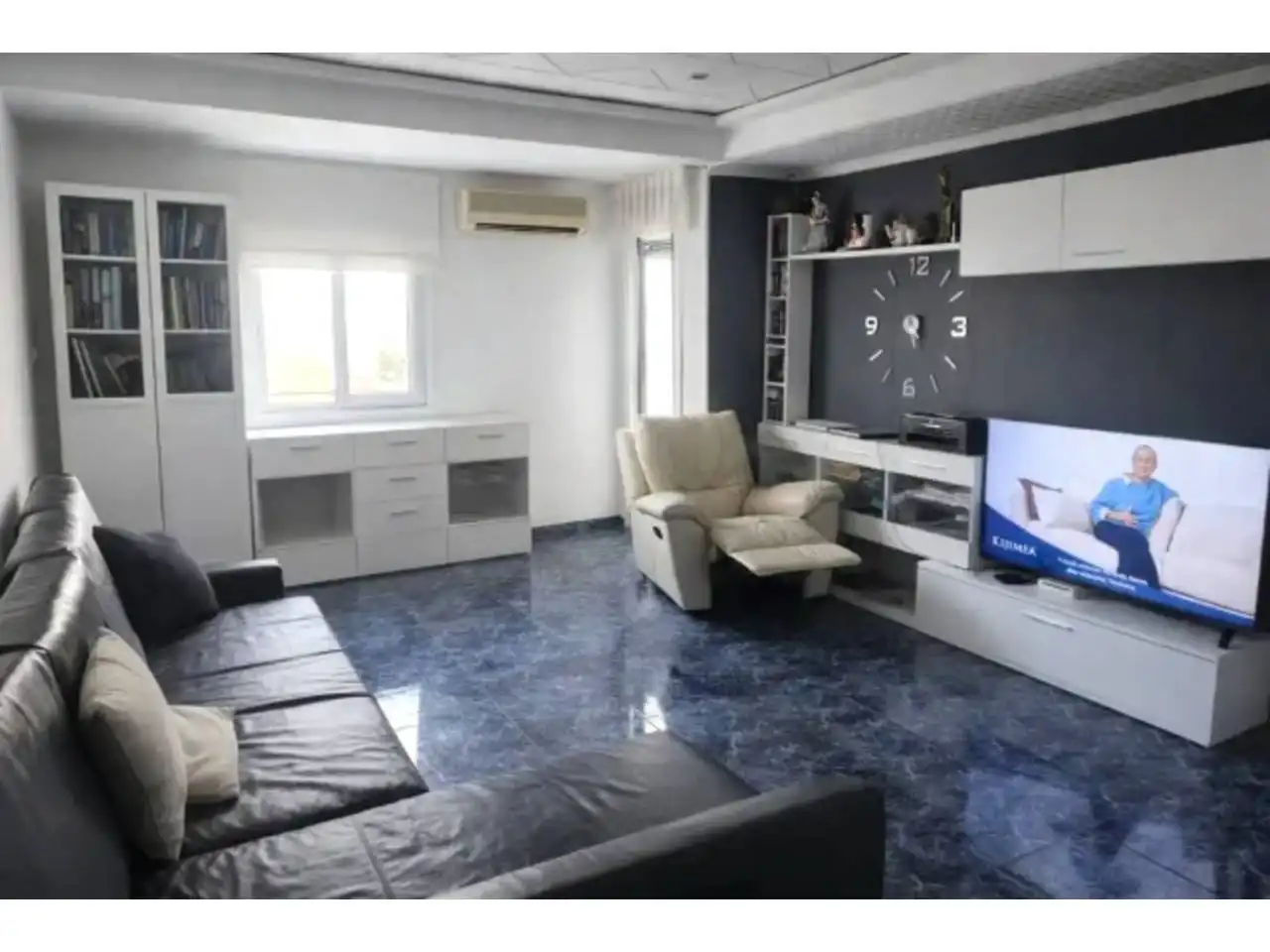 Sala de estar de Piso en venta en Simat de la Valldigna con Aire acondicionado, Trastero y Amueblado