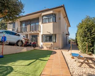 Exterior view of Single-family semi-detached for sale in Terrassa  with Air Conditioner, Heating and Private garden