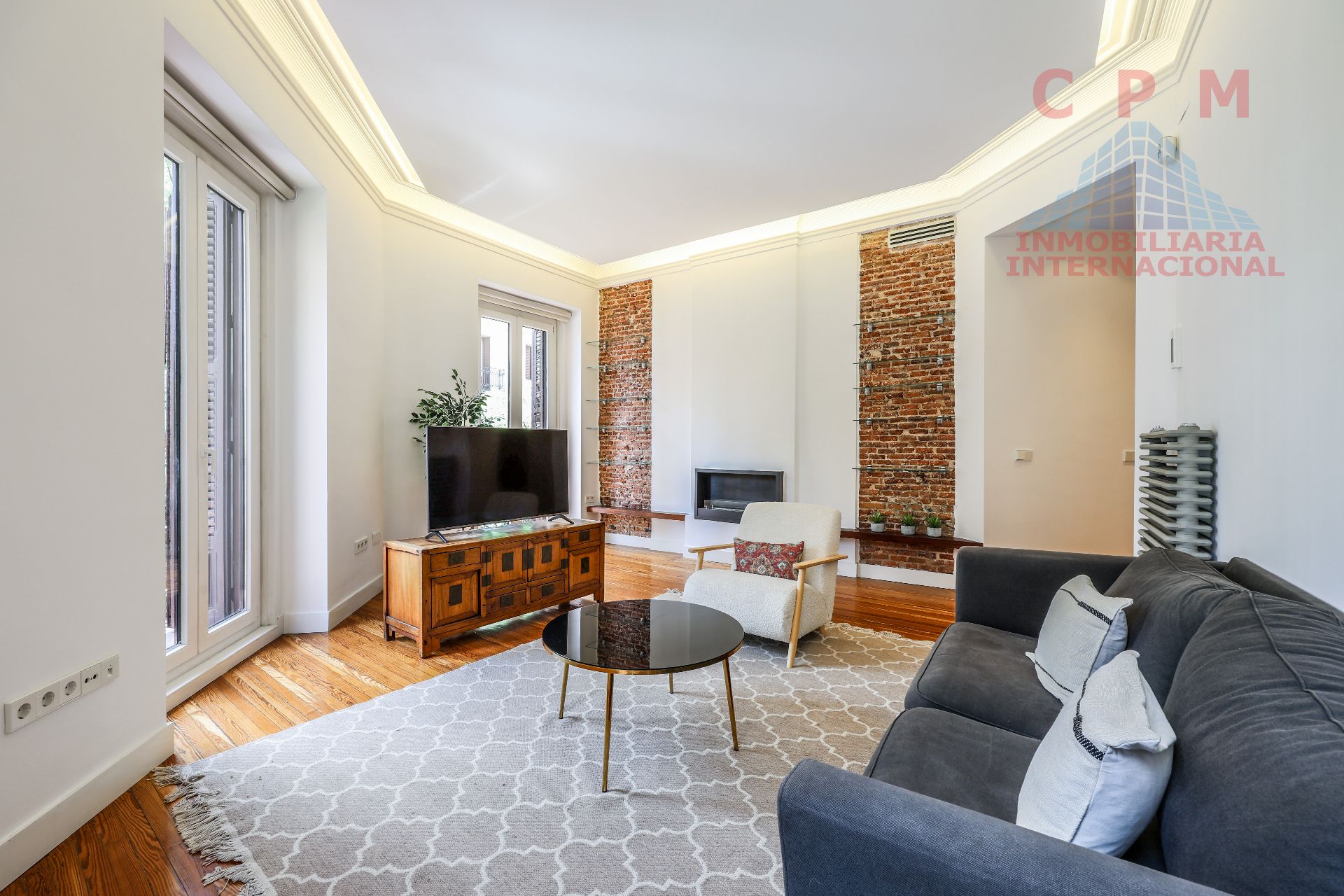 Living room of Flat to rent in  Madrid Capital  with Air Conditioner, Heating and Parquet flooring