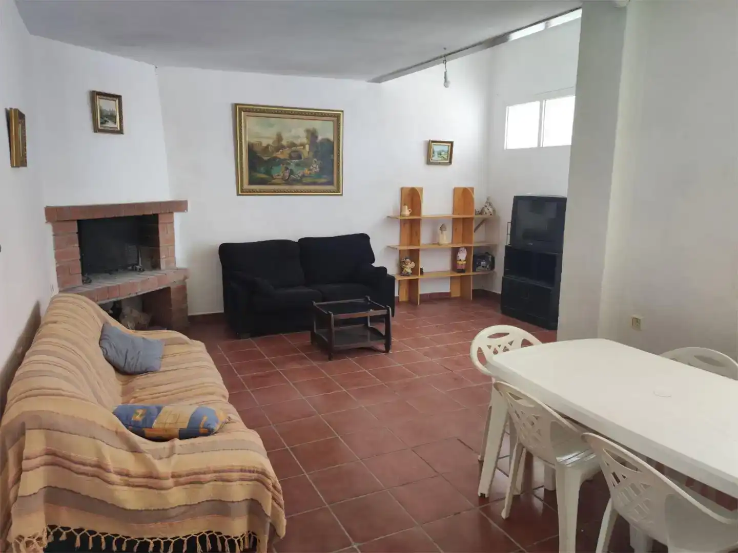Sala d'estar de Casa adosada en venda en Osa de la Vega