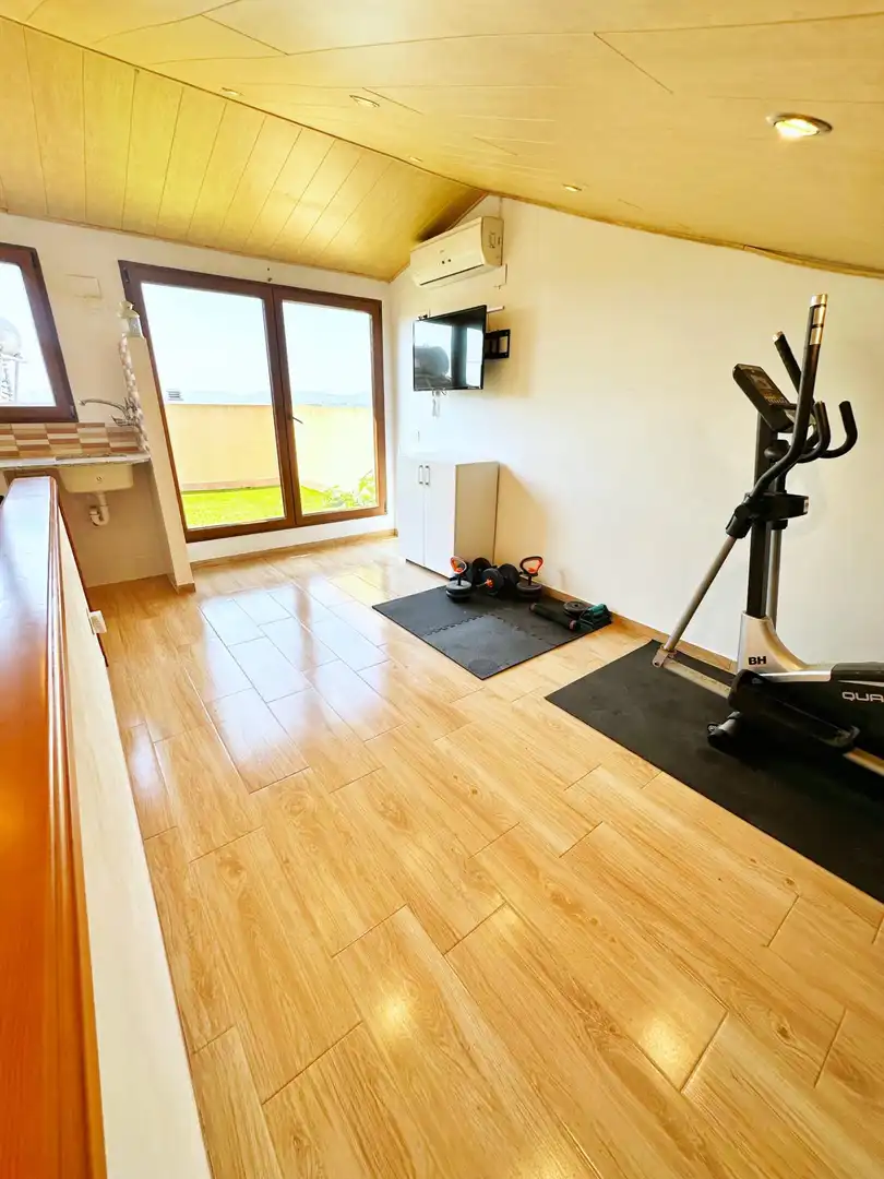 Sala de estar de Casa adosada en venta en Castelló de Rugat con Aire acondicionado, Calefacción y Jardín privado