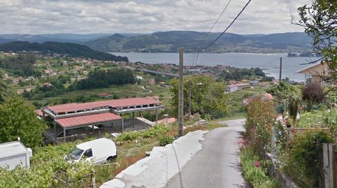 Interesante solar con estructura con licencia para terminar en Vilaboa