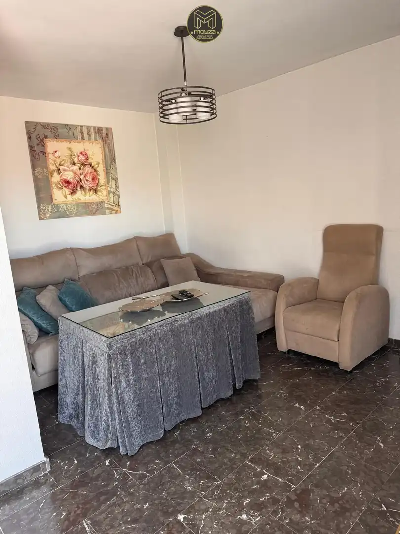 Wohnzimmer von Dachboden zum Verkauf in Martos mit Heizung und Terrasse