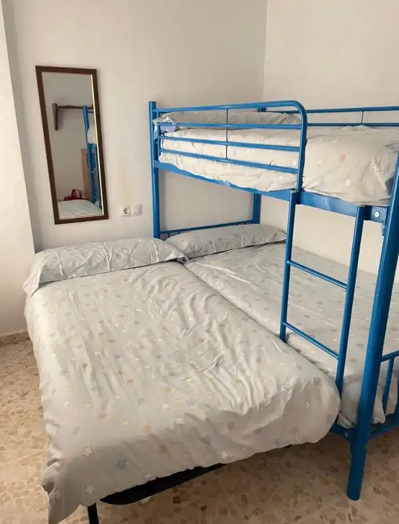 Dormitori de Pis de lloguer en Chipiona amb Aire condicionat, Moblat i Rentadora