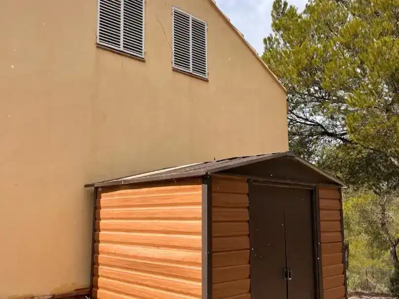 Vista exterior de Casa o xalet en venda en Huéscar amb Jardí privat, Piscina i Moblat