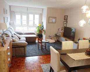 Living room of Flat for sale in Gijón   with Heating, Parquet flooring and Furnished