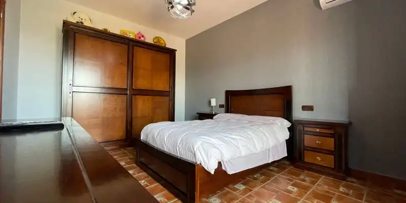 Dormitori de Casa o xalet en venda en Loja amb Aire condicionat, Jardí privat i Terrassa