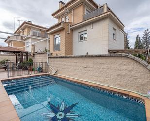 Swimming pool of House or chalet for sale in  Granada Capital  with Air Conditioner, Heating and Parquet flooring