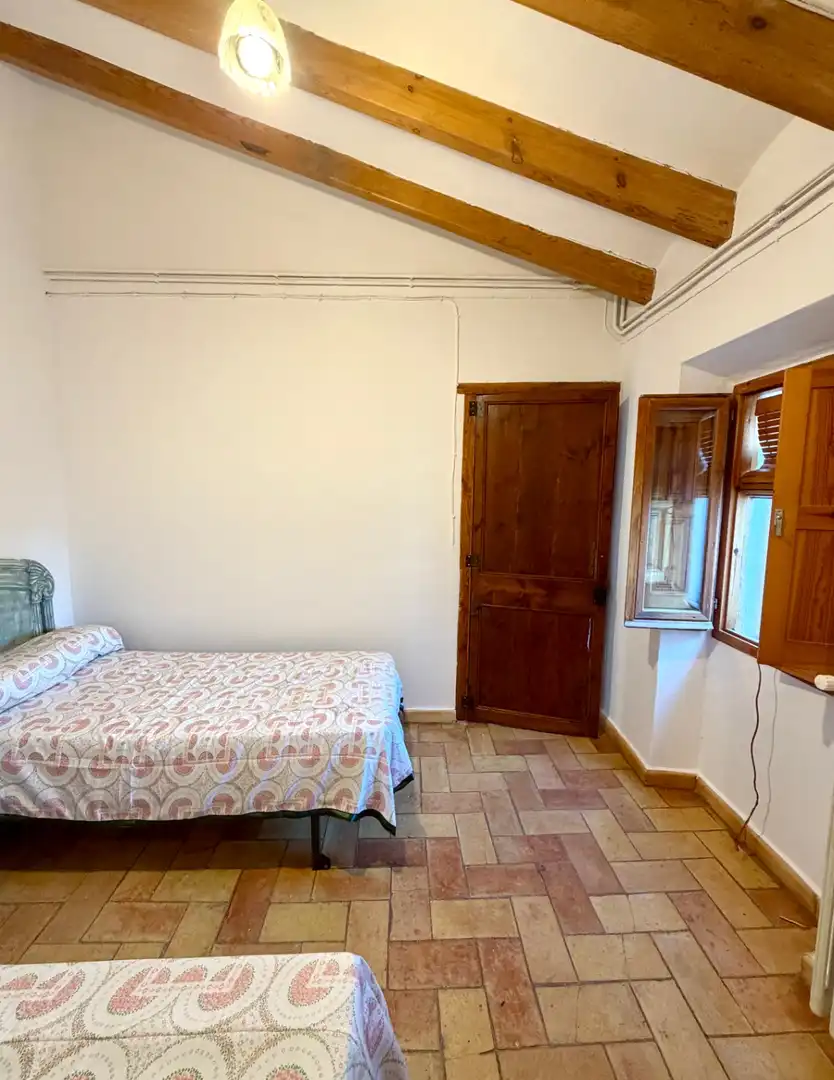 Dormitori de Finca rústica de lloguer en Canyelles amb Aire condicionat, Calefacció i Jardí privat
