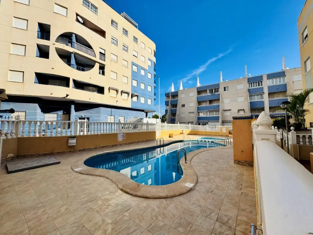 Swimming pool of Flat for sale in Torrevieja  with Air Conditioner, Terrace and Furnished