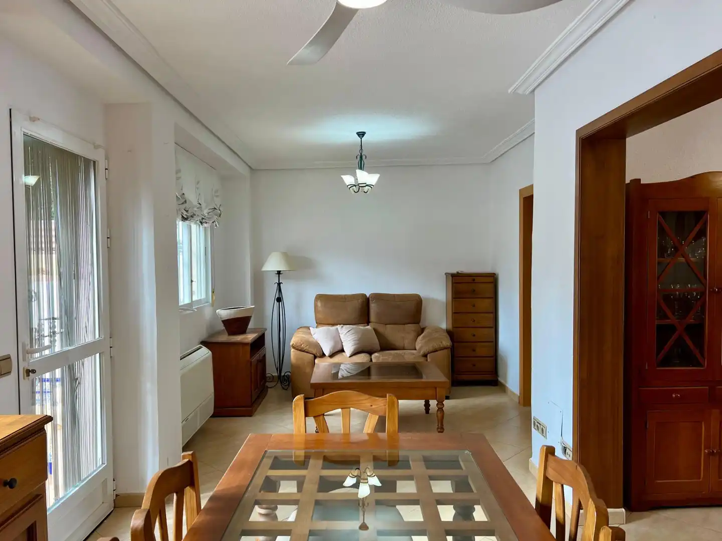 Sala de estar de Casa adosada en venta en La Nucia con Aire acondicionado, Jardín privado y Trastero
