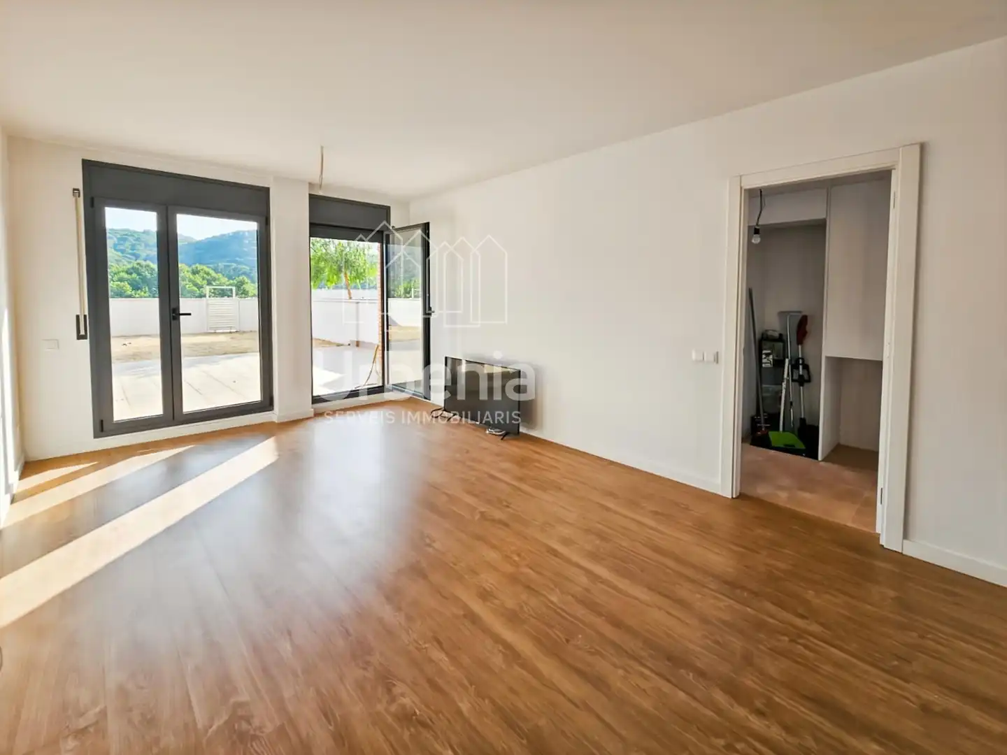 Sala d'estar de Pis en venda en Sant Iscle de Vallalta amb Calefacció, Jardí privat i Terrassa